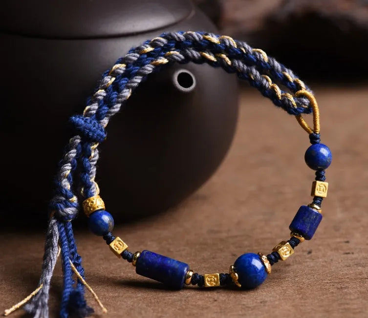 Close-up of a hand-woven flexible wire watch band in Lapis Lazuli blue colour.