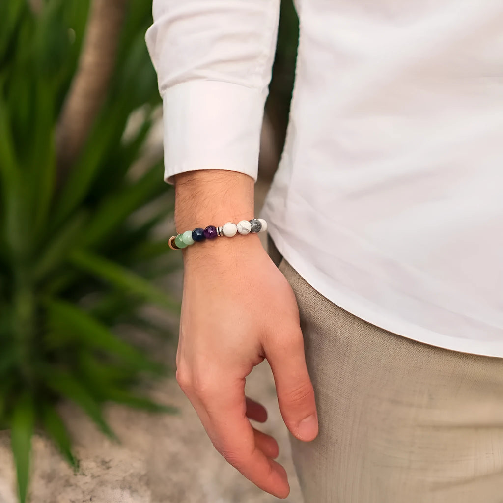 Women's flat knot braided bracelet in aquamarine with geometric woven patterns.