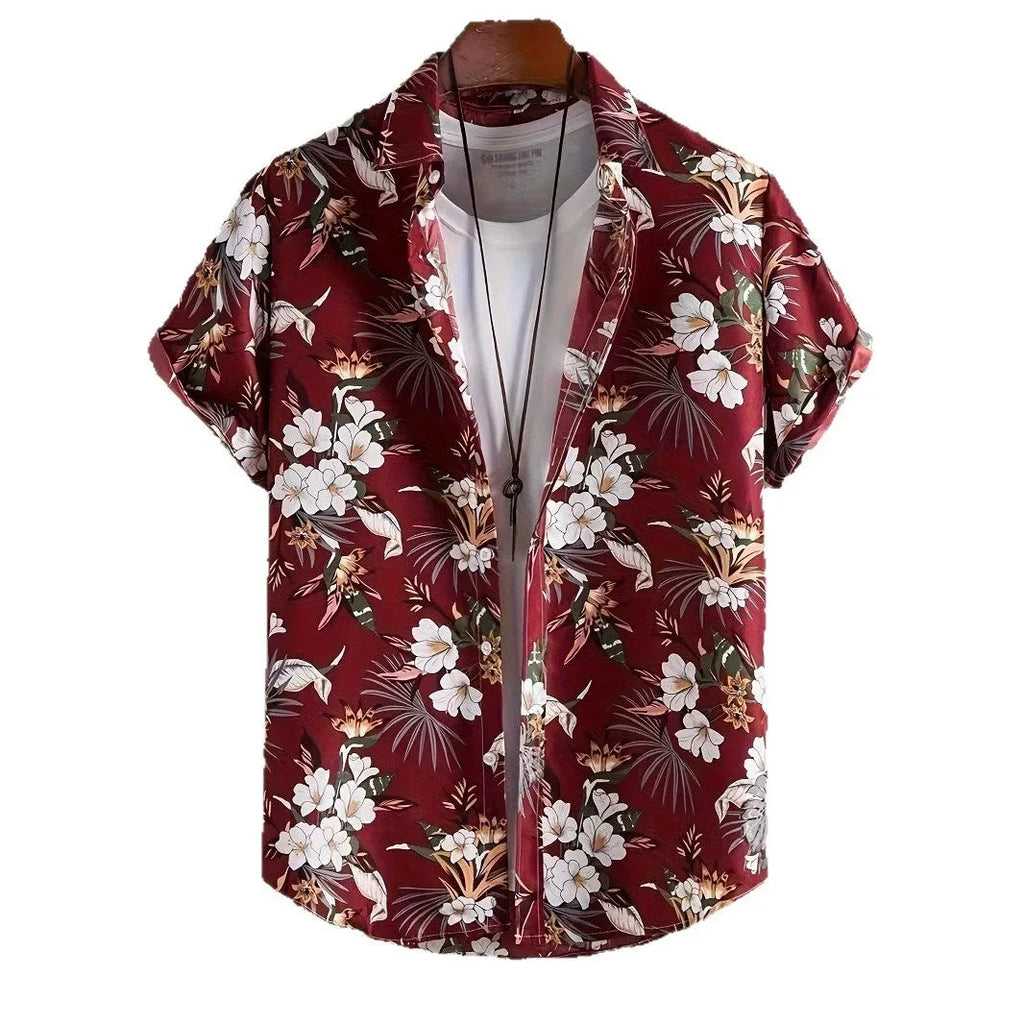 Man wearing a loose grey short sleeve shirt with a raised white 3D flower print pattern.