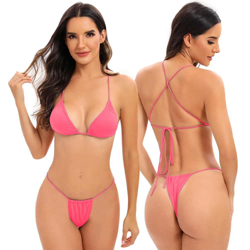 Women's candy coloured cross strap bikini swimsuit with multiple adjustable straps on a mannequin.