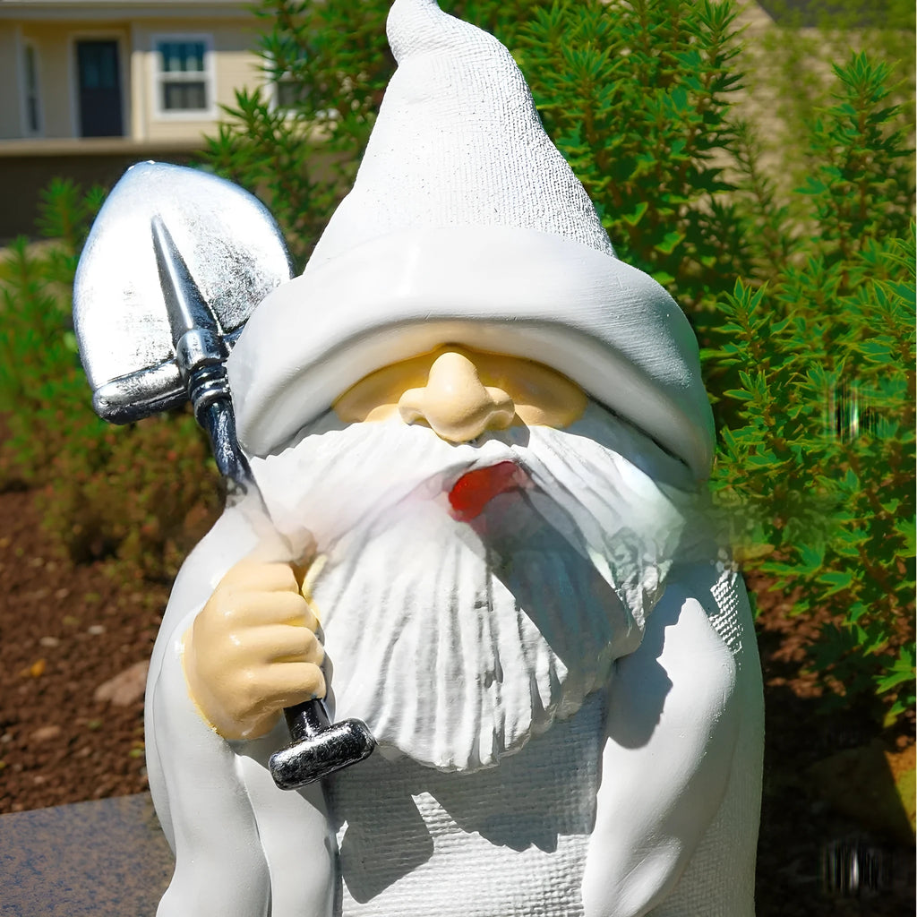 Resin Christmas ornament depicting dwarf character holding smoking pipe and shovel