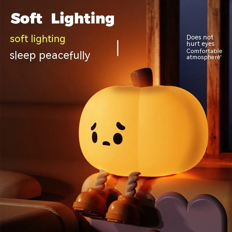 Soft silicone pumpkin night light with touch controls and warm LED glow