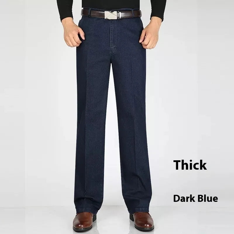 Men's high-waist loose-fit blue denim jeans on a hanger, showing the zip fly and relaxed leg cut.