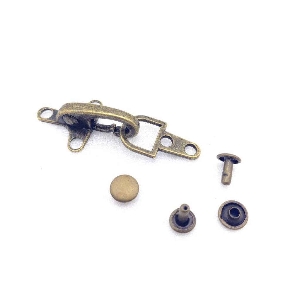 Zinc alloy aircraft-shaped hanging buckle in metallic finish, shown next to a ruler indicating 5.85cm size.