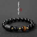 Handmade obsidian bracelet with red and yellow tiger eye stone beads