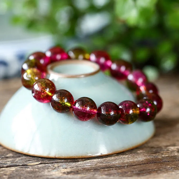 Watermelon crystal bracelet showing pastoral design details and available size options