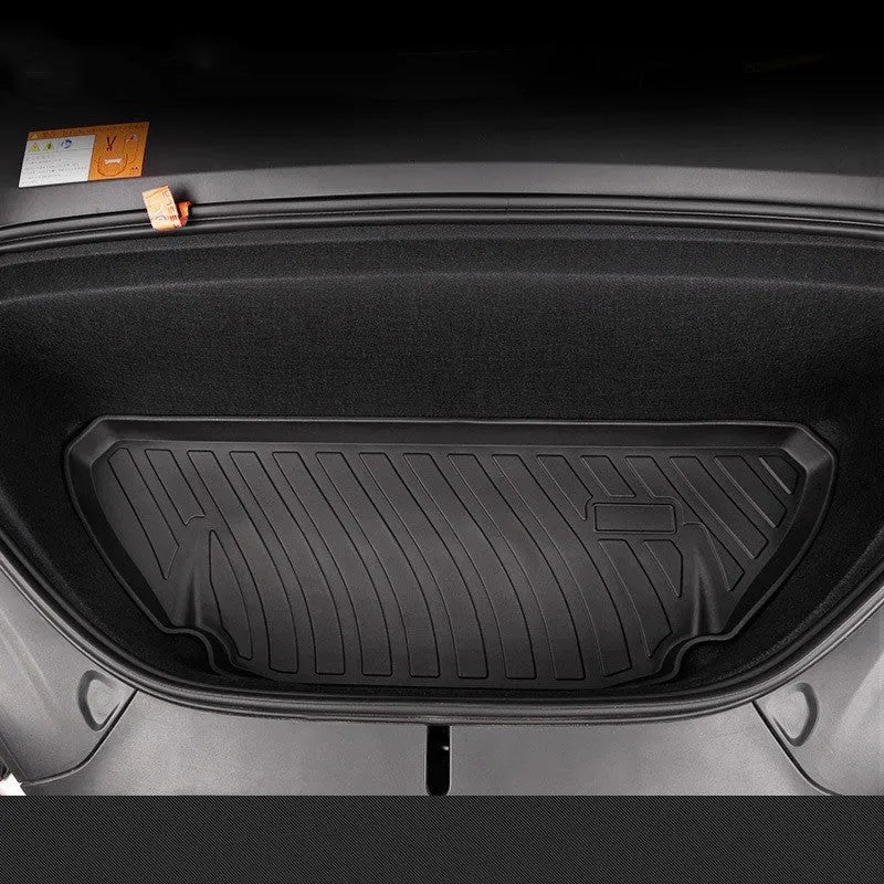 Rubber floor mat for Tesla car with TPE footrest section.