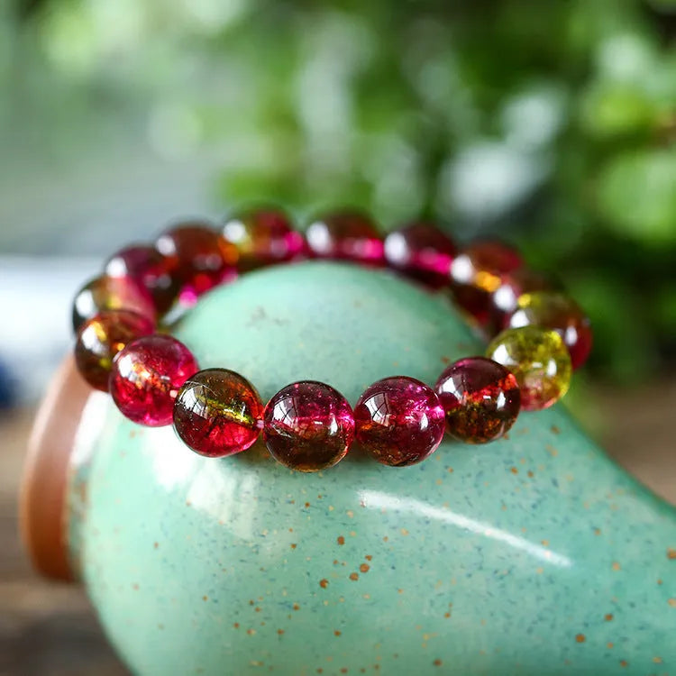 Watermelon crystal bracelet showing pastoral design details and available size options