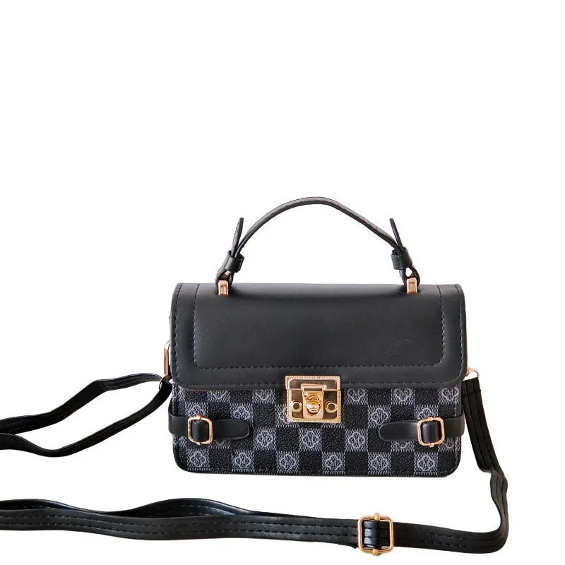 Small square retro patterned crossbody bag in PU leather with a file compartment inside.