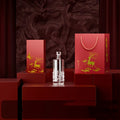 Two crystal glass wine bottles with deer design in a gift set with boxes and handbag