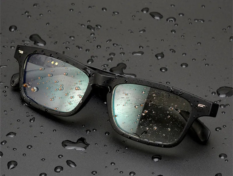 Black smart glasses with semi-open ear design showcasing integrated speakers for Bluetooth audio and calls.