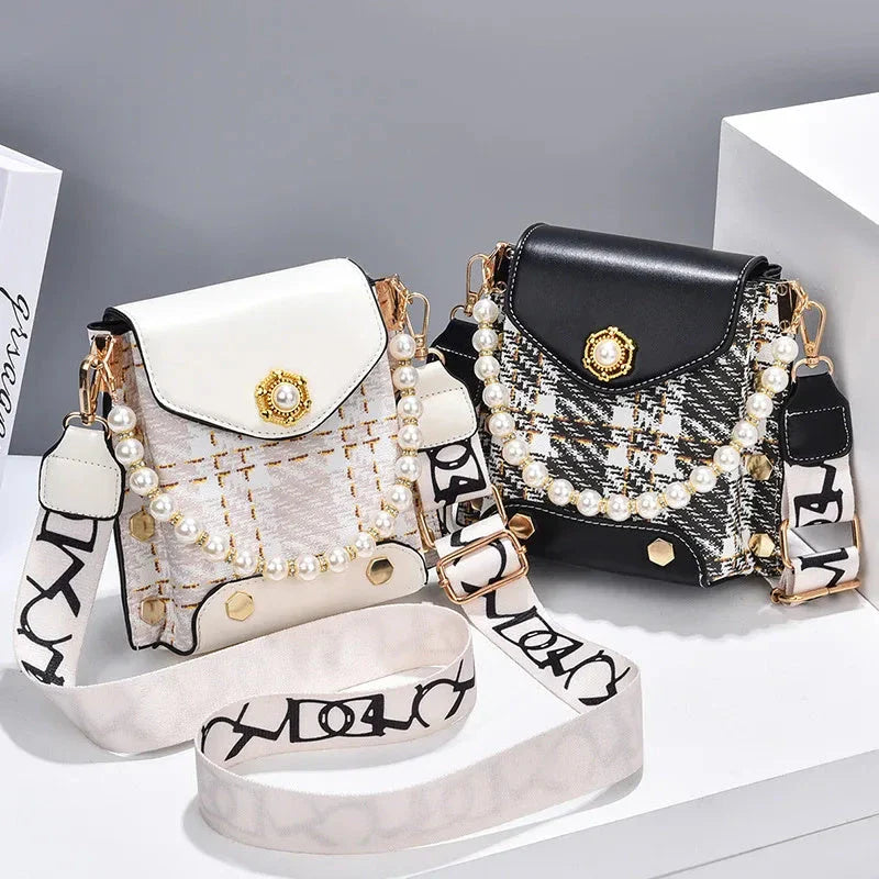 Stylish crossbody bag with pearl chain, made of durable PU leather and available in multiple colors