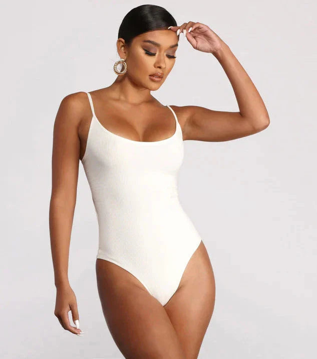 Stylish backless one-piece swimsuit for women in various vibrant solid colors