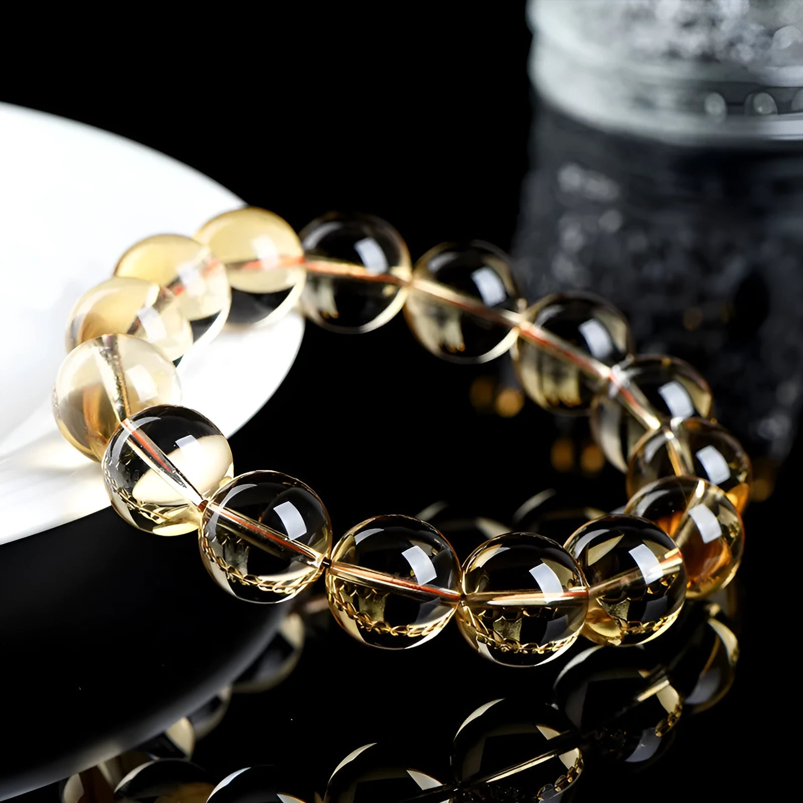 Natural citrine scattered beads ball bracelet in 7A grade colour on a wrist.