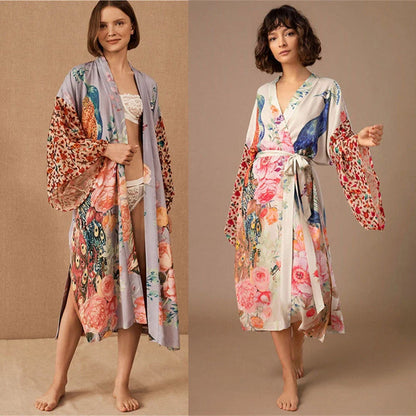 Peacock print beach cover-up in light pink and milky white, offering sun protection and style