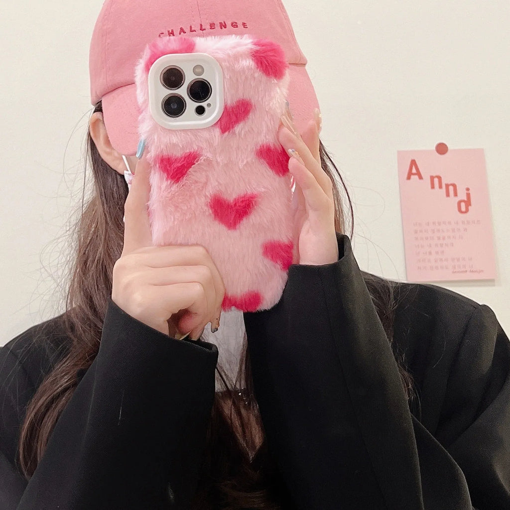 Pink silicone phone case with a cartoon design, shown fitted on an Apple iPhone.