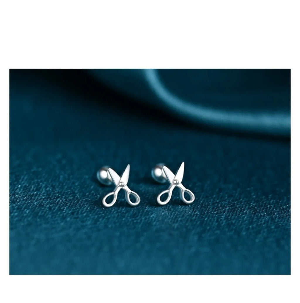 Pure silver ear nail earrings with screw closure and decorative mini scissors charm