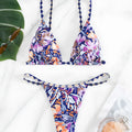 Women's floral print one-piece swimsuit with triangle bag design and split back in polyester.