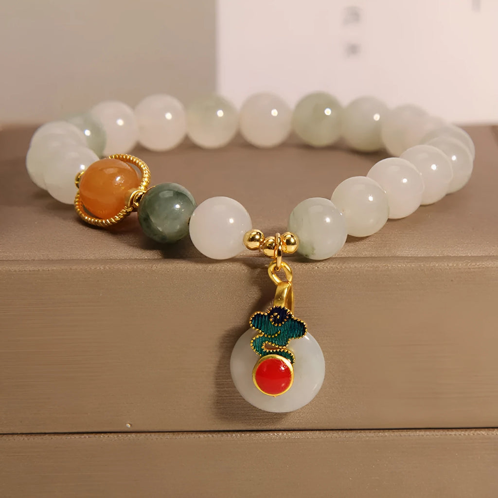 Women's ice jade bracelet with pearl accents and traditional jade buckle