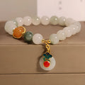 Women's ice jade bracelet with pearl accents and traditional jade buckle