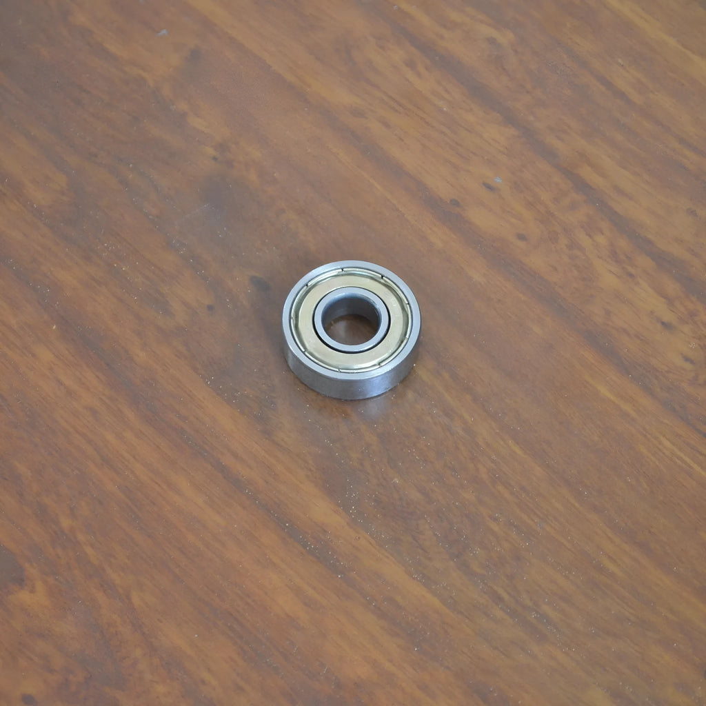 6000zz carbon steel miniature ball bearing showing 10mm inner diameter and 26mm outer diameter.