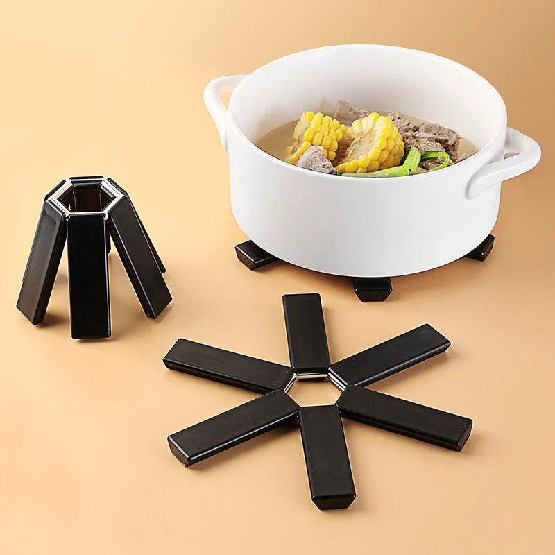 Foldable heat-resistant silicone pot holder with anti-slip and anti-scald design for kitchen use