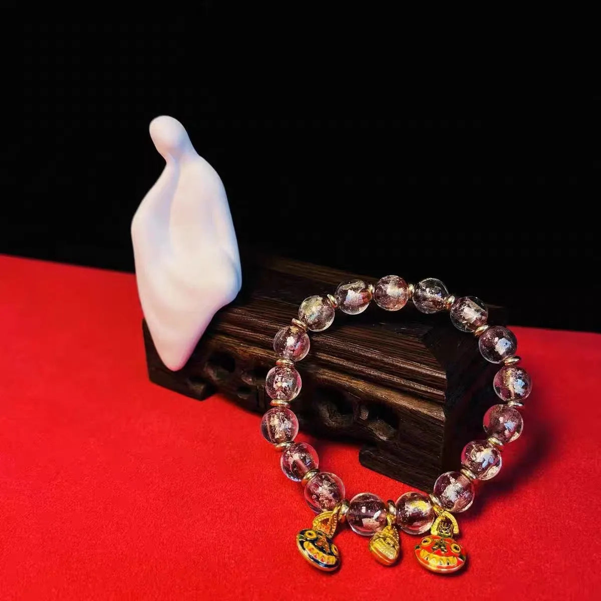 Glass court style bracelet with ancient French glaze finish showing geometric auspicious patterns