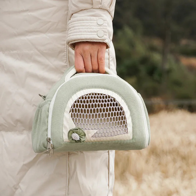 Hamster breathable crossbody handbag with outer strap in mesh fabric, available in multiple colours.