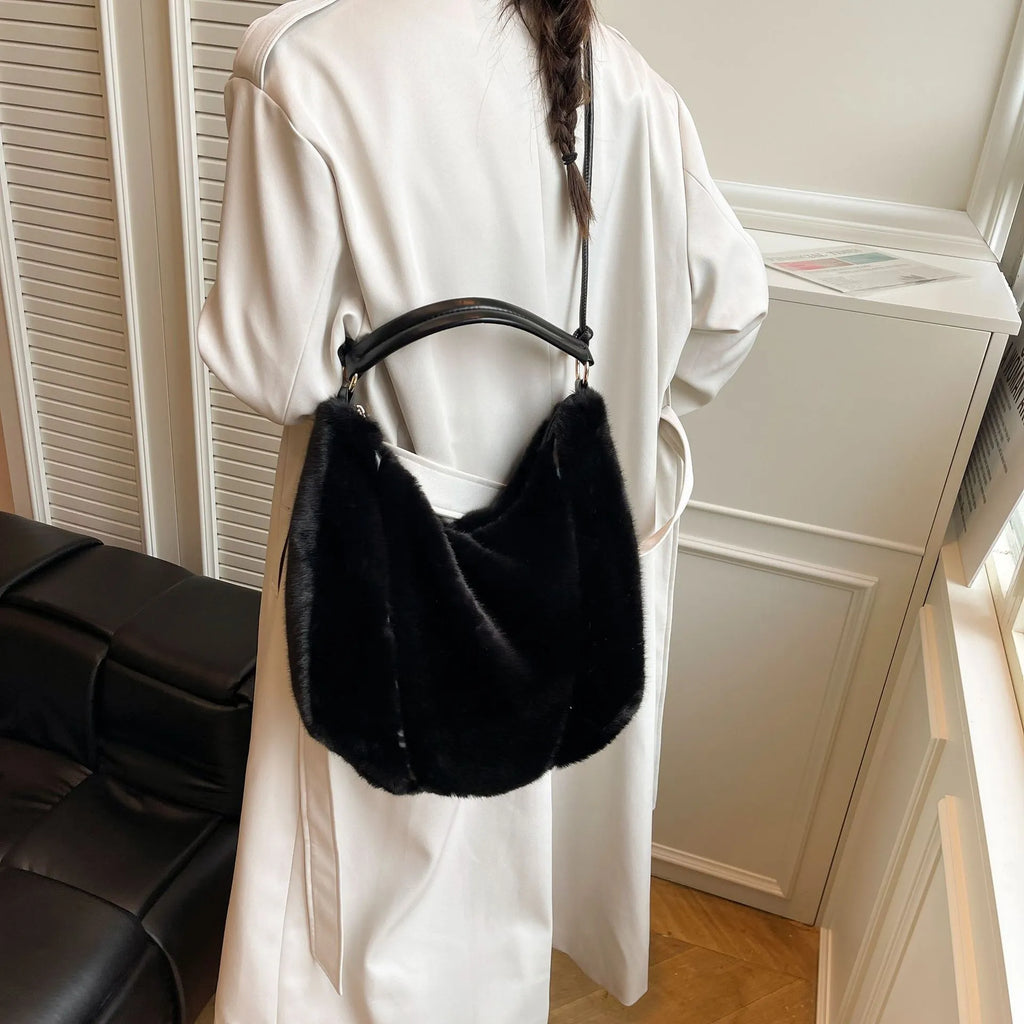 Beige one shoulder underarm bag in plush with splicing details, horizontal square shape, and single strap