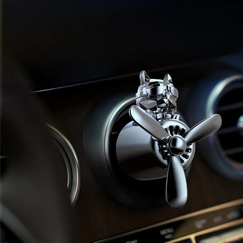 Car air vent aromatherapy with electroplated pit bull shape holder in black on a standard car air vent grill
