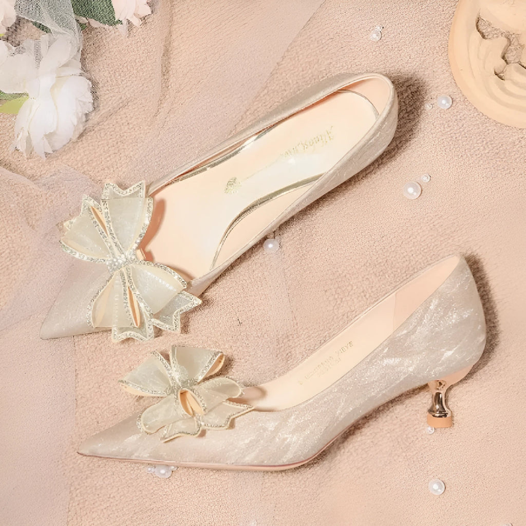 Champagne sequin stiletto heel pumps with crystal embellishment for wedding events.