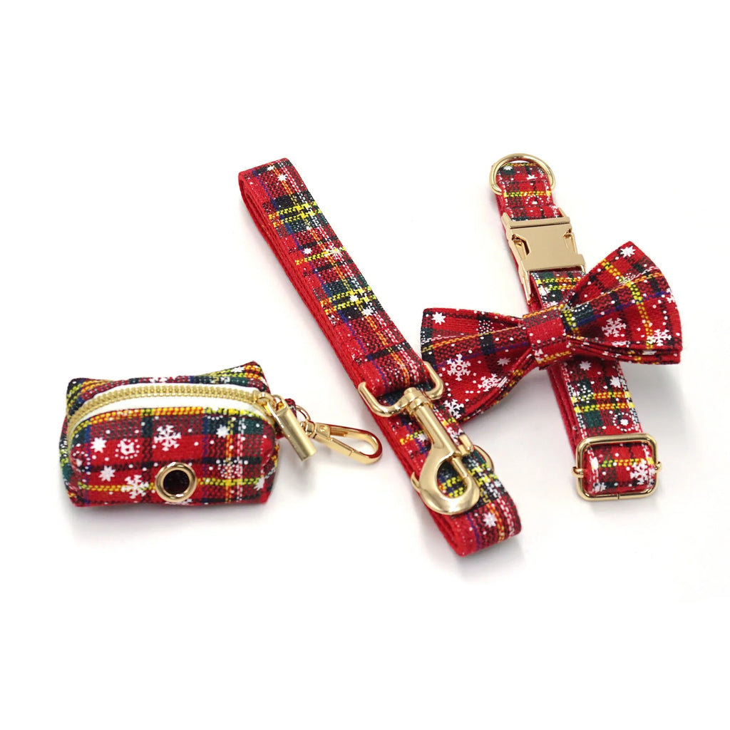 Red cloth Christmas dog collar and harness set with matching bow tie and waste bag holder on size tag
