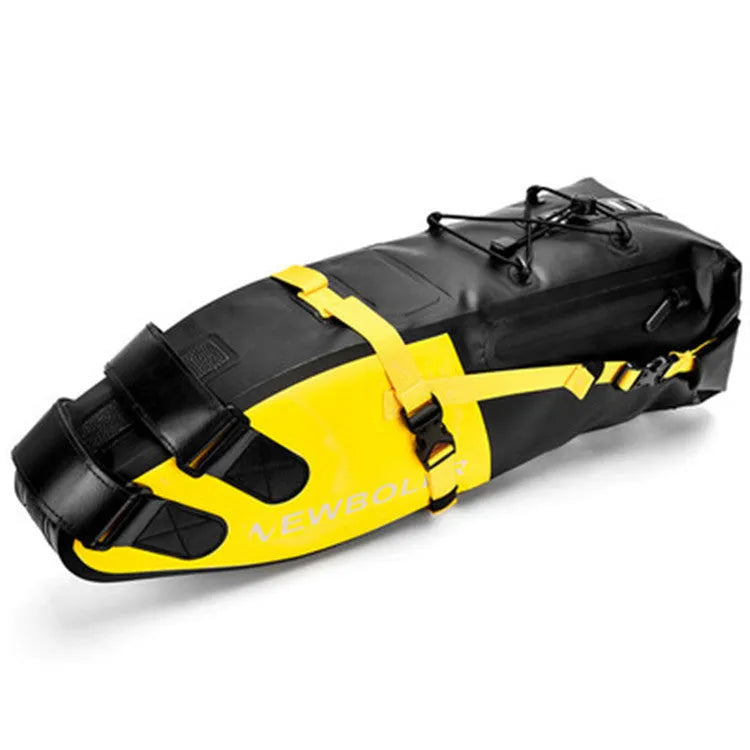 Large yellow waterproof PVC tail bag mounted on a bicycle rear, showing its 13L capacity.