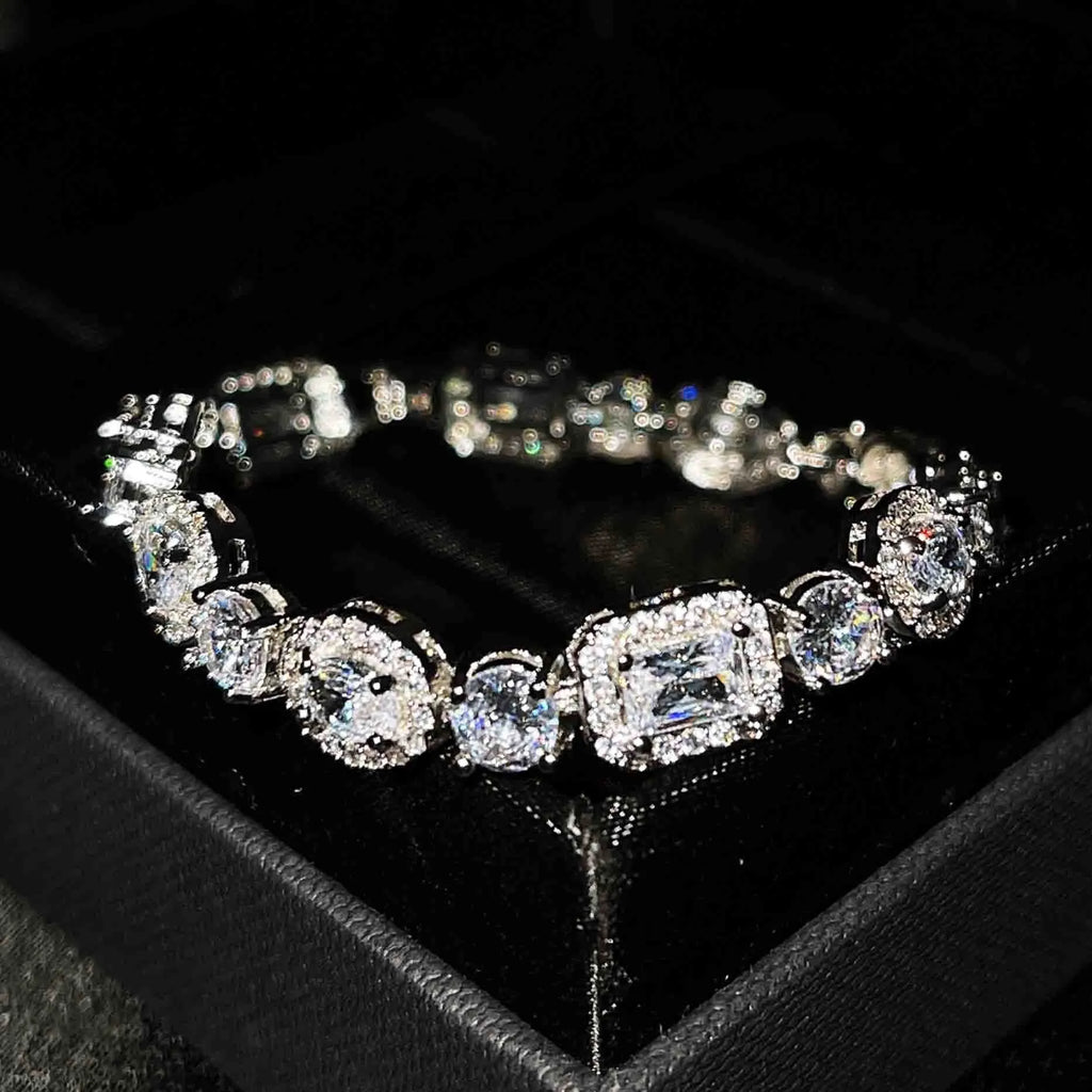 Women's silver-plated bracelet with sparkling zircon stones in a geometry shape.