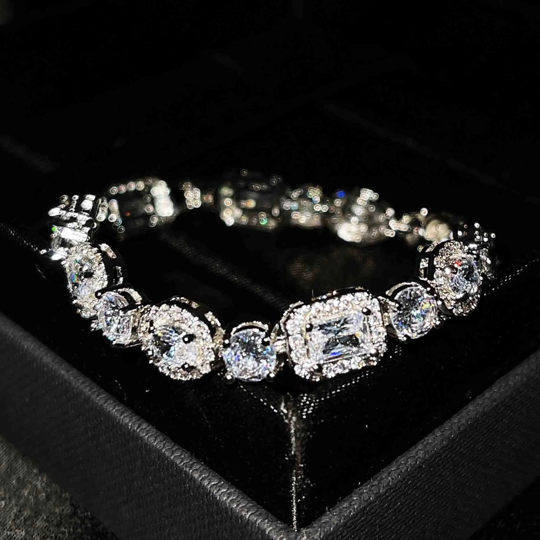Women's silver-plated bracelet with sparkling zircon stones in a geometry shape.