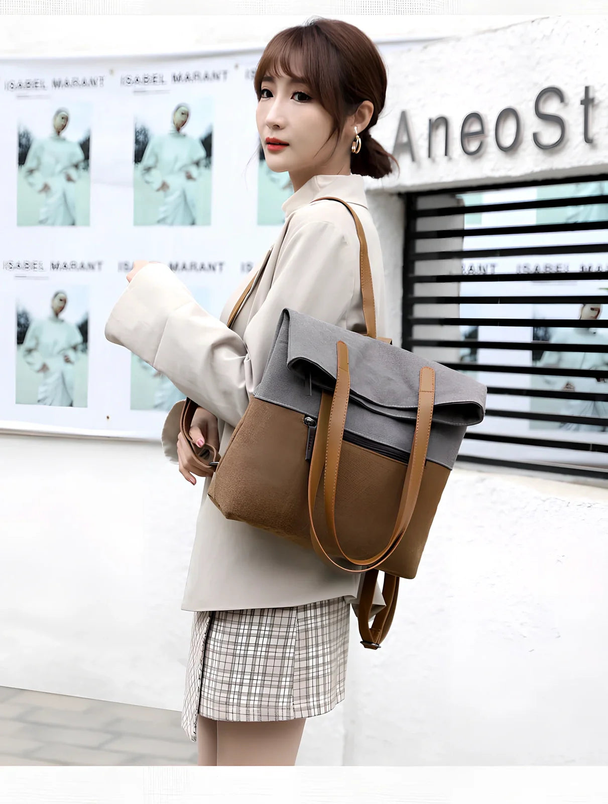 Canvas tote bag in black converts to backpack, 30x10x39cm size with zipper and polyester lining
