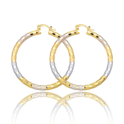Gold geometric alloy earrings with ring detail, perfect for modern styling