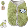 Green thickened coral fleece dog vest with leash ring on a small dog