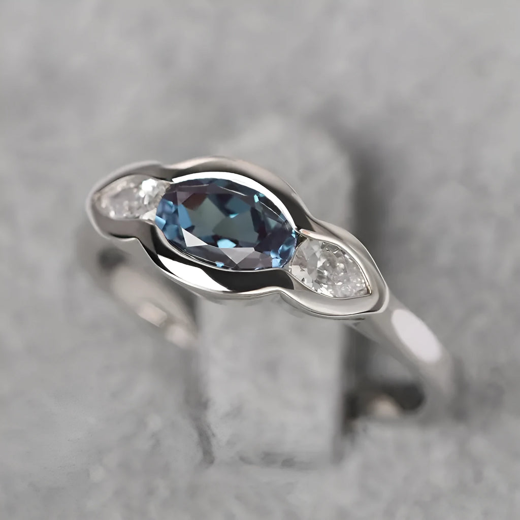 Women's geometric ellipse ring with zircon stone in white gold colour finish on model finger