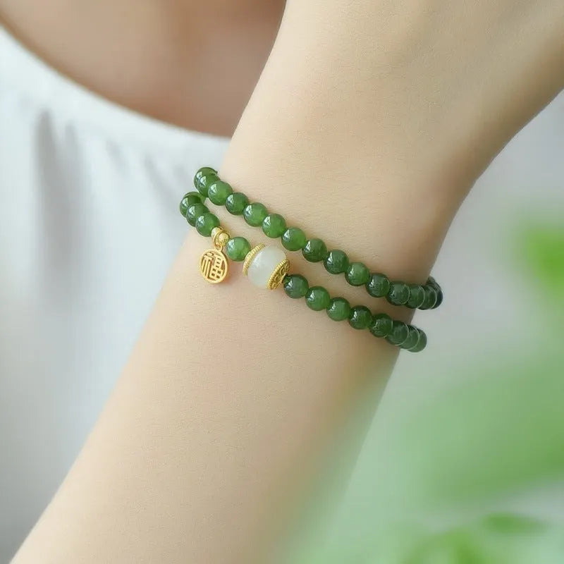 Women's double circle bracelet made of natural Hetian jade featuring a fu character, 6mm size.