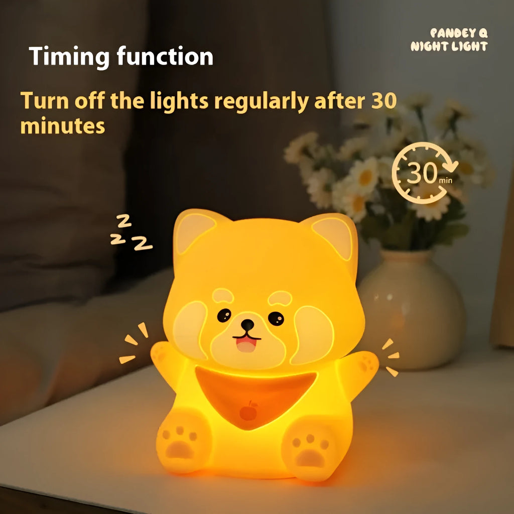 New Homehold Lesser Panda bedside lamp with silicone shade and USB charging cable on a table