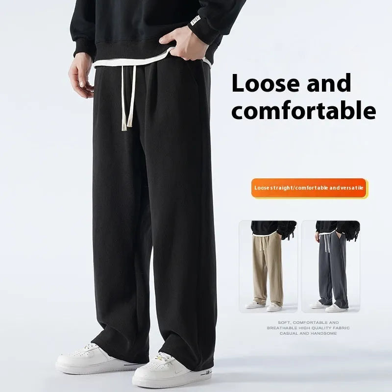 Men's double-sided polar fleece winter trousers in apricot colour showing loose Korean style and drawstring waist