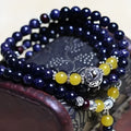 Blue San beads ethnic bracelet showing manual bead construction and circular wrapping design