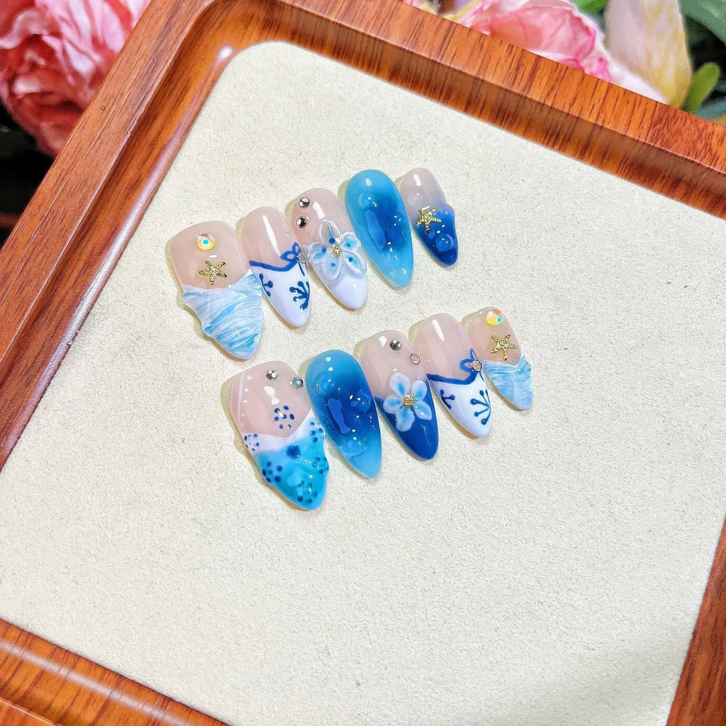 Blue hand-painted carved summer ice transparent false nails set in plastic wearable armour
