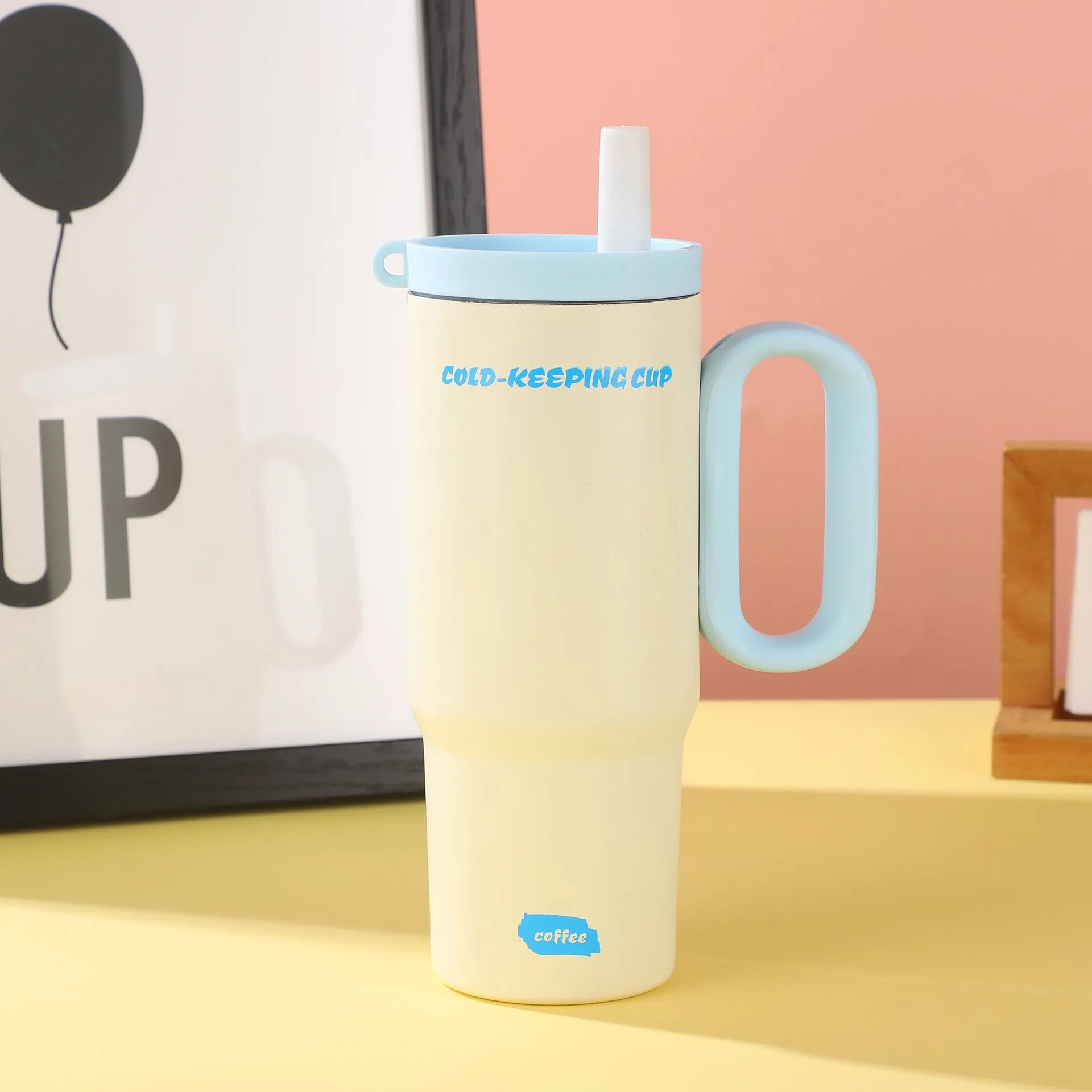 Portable straw cup with carry handle in multiple colour options showing heat preservation and cold storage properties