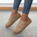 Women's brown canvas slippers with closed toe and low top design
