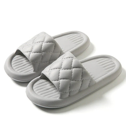 Stylish and comfortable rhombus-patterned slippers for indoor and bathroom use, featuring breathable, waterproof, and non-slip design in multiple vibrant colors.