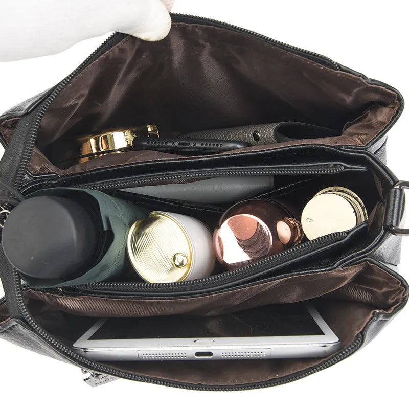 Women's PU leather shoulder messenger bag with double straps, splicing detail, available in multiple colours including yellow and black