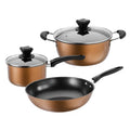 Three-piece cast iron cookware set showing a soup pot, milk pot, and wok with light luxury finish.