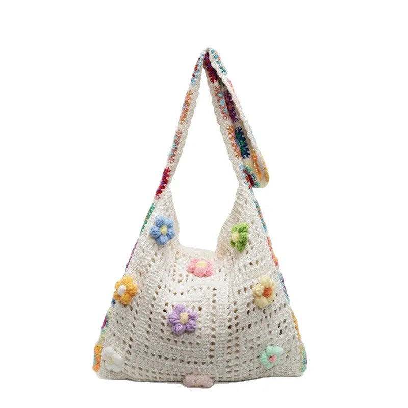 Casual woven beach shoulder bag in polyester material with hollow knitted construction